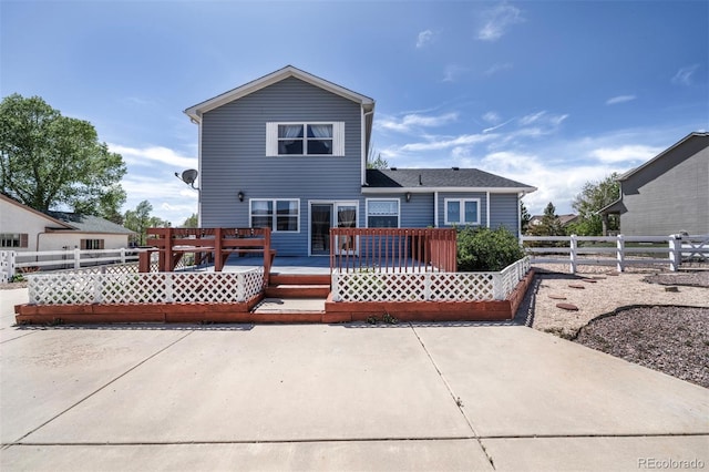 11577 Cranston Dr, Peyton, CO 80831 - rear view of property featuring a deck and a patio