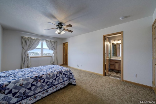 11577 Cranston Dr, Peyton, CO 80831 - bedroom with light colored carpet, baseboards, ceiling fan, and ensuite bathroom