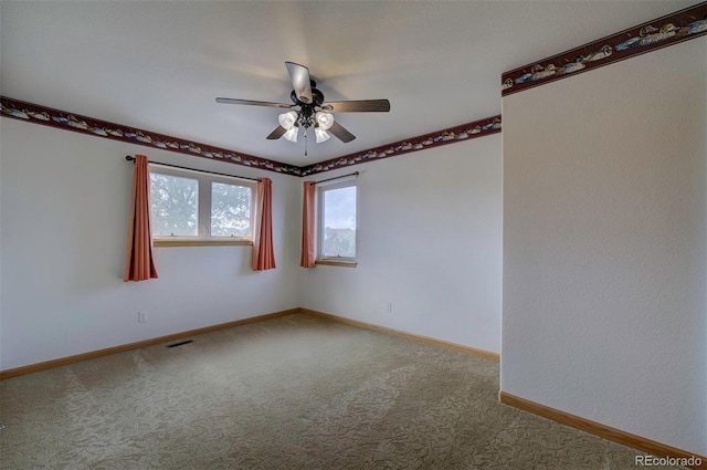 11577 Cranston Dr, Peyton, CO 80831 - spare room with carpet flooring, ceiling fan, and baseboards