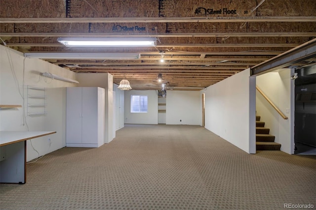 11577 Cranston Dr, Peyton, CO 80831 - below grade area with carpet flooring and stairs
