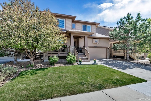 21658 E Tallkid Ave, Parker, CO 80138 - view of front of home featuring stairway, driveway, a front yard, a garage, and covered porch