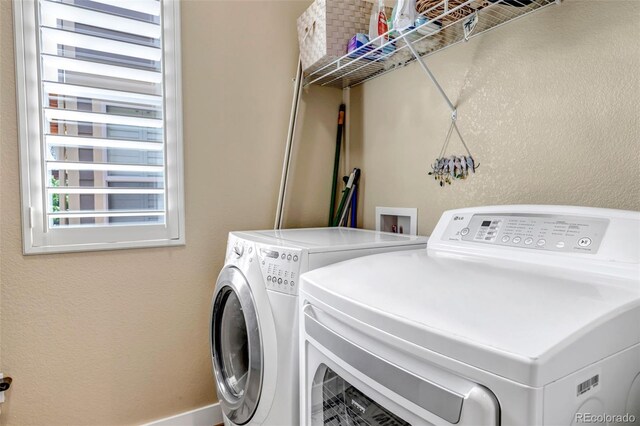 21658 E Tallkid Ave, Parker, CO 80138 - laundry room featuring washer and clothes dryer