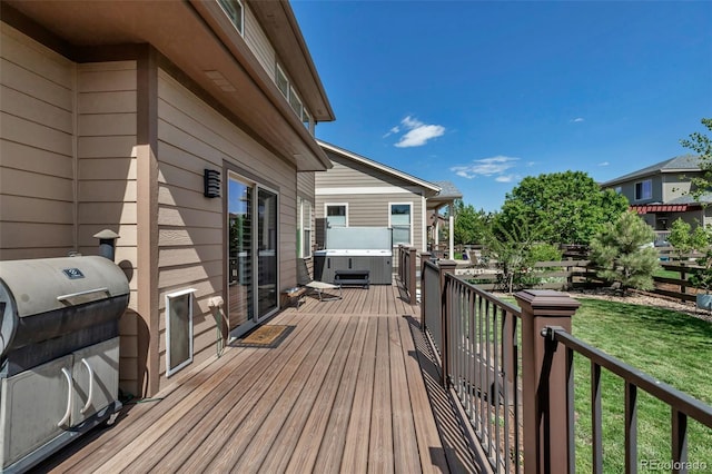 21658 E Tallkid Ave, Parker, CO 80138 - wooden terrace with a hot tub and a lawn