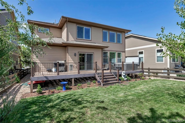 21658 E Tallkid Ave, Parker, CO 80138 - rear view of house featuring a fenced backyard and a deck