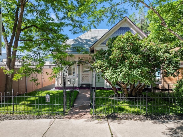 2323 W Pikes Peak Ave, Colorado Springs, CO 80904 - view of front of home with a fenced front yard and a gate