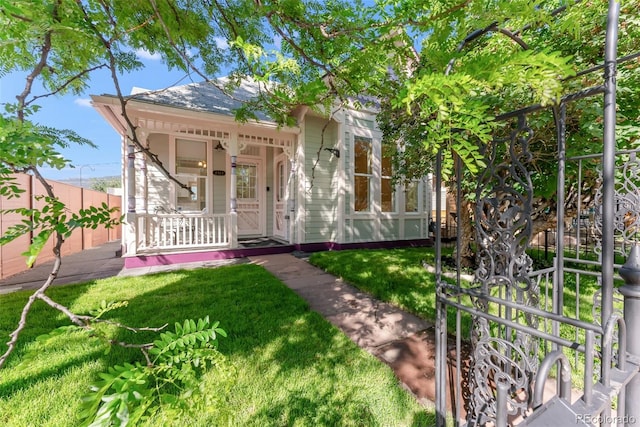2323 W Pikes Peak Ave, Colorado Springs, CO 80904 - view of front of house with a porch and roof with shingles
