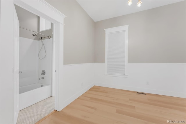 2323 W Pikes Peak Ave, Colorado Springs, CO 80904 - full bath featuring wood finished floors and shower / tub combination