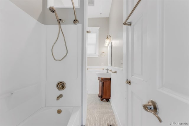 2323 W Pikes Peak Ave, Colorado Springs, CO 80904 - bathroom with bathtub / shower combination, vanity, and tile patterned floors