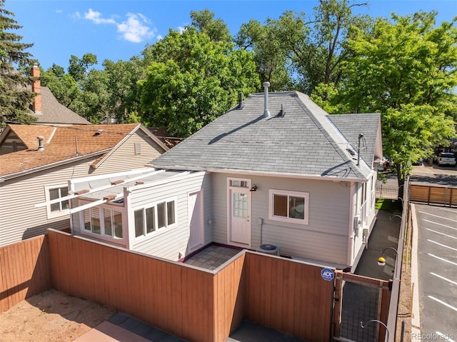 2323 W Pikes Peak Ave, Colorado Springs, CO 80904 - back of property with a shingled roof