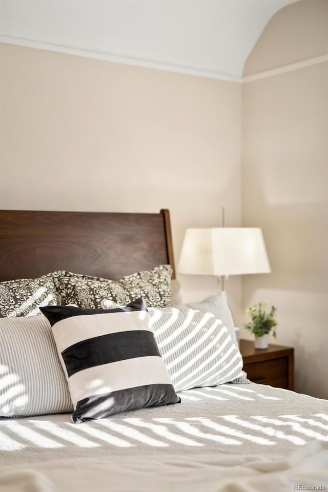 bedroom with crown molding