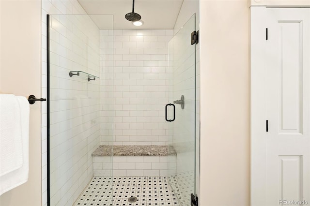 bathroom featuring a stall shower