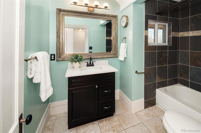 full bath with shower / bathing tub combination, toilet, vanity, tile patterned flooring, and baseboards