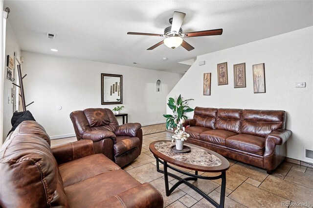 1419 Swan Ave, Brighton, CO 80601 - living room featuring ceiling fan, baseboards, recessed lighting, and a baseboard heating unit