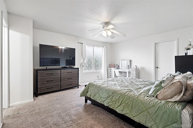 1419 Swan Ave, Brighton, CO 80601 - bedroom featuring carpet flooring, baseboards, a textured ceiling, and ceiling fan