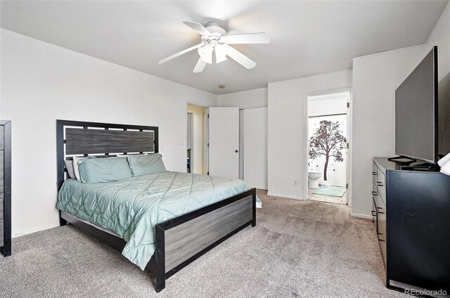 1419 Swan Ave, Brighton, CO 80601 - carpeted bedroom featuring ensuite bathroom, a ceiling fan, and baseboards