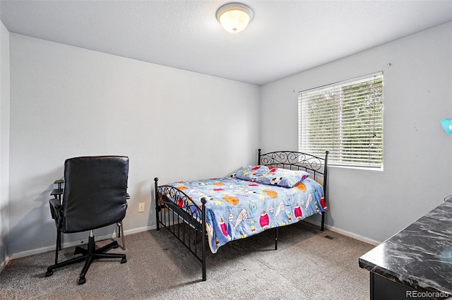 1419 Swan Ave, Brighton, CO 80601 - carpeted bedroom with baseboards