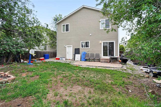1419 Swan Ave, Brighton, CO 80601 - rear view of property with a patio area and entry steps