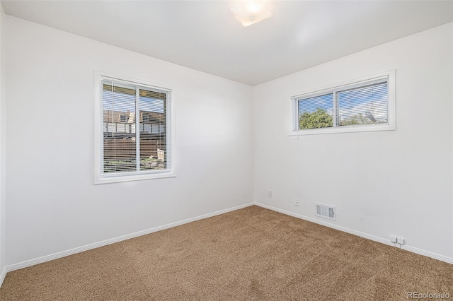 view of carpeted spare room