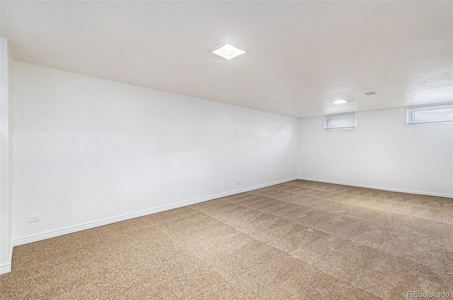 unfurnished room with carpet floors