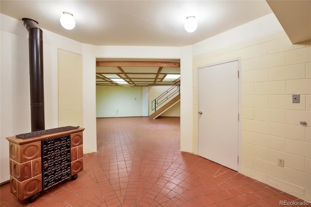 1000 Ponderosa Way, Woodland Park, CO 80863 - finished basement with stairs and tile patterned floors