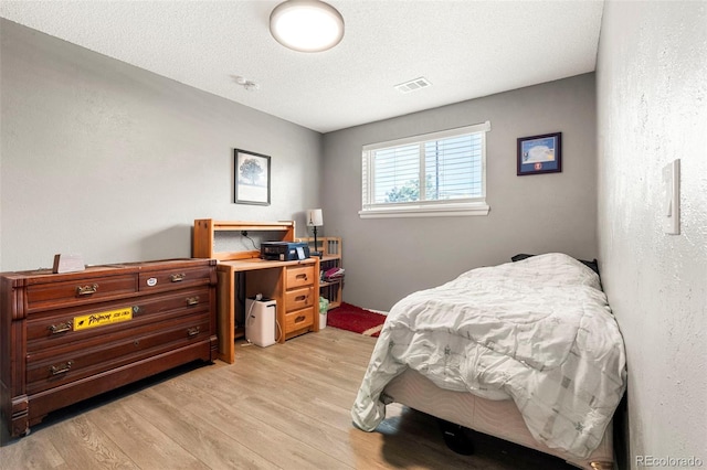 16259 W 10th Ave Unit L2, Golden, CO 80401 - bedroom with light wood-type flooring