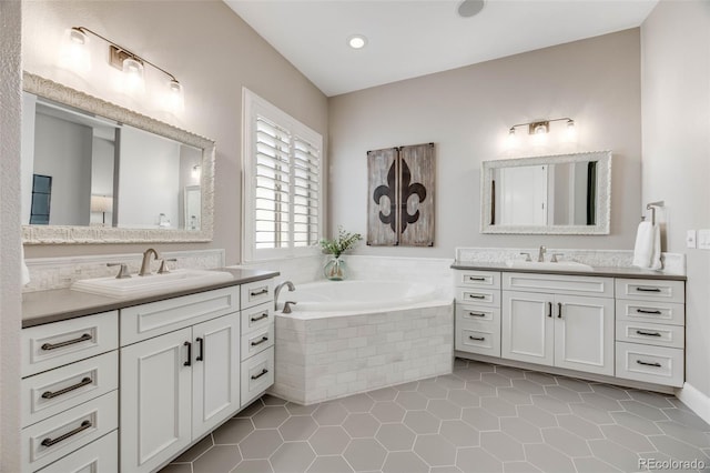 360 Basilwood Way, Highlands Ranch, CO 80126 - full bathroom featuring two vanities, tile patterned flooring, a garden tub, and recessed lighting