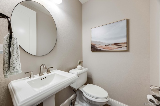 360 Basilwood Way, Highlands Ranch, CO 80126 - bathroom featuring toilet and baseboards