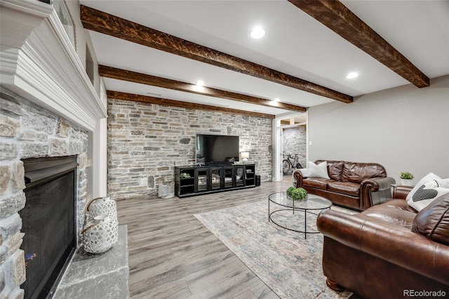 360 Basilwood Way, Highlands Ranch, CO 80126 - living area with beam ceiling, a fireplace, wood finished floors, and recessed lighting