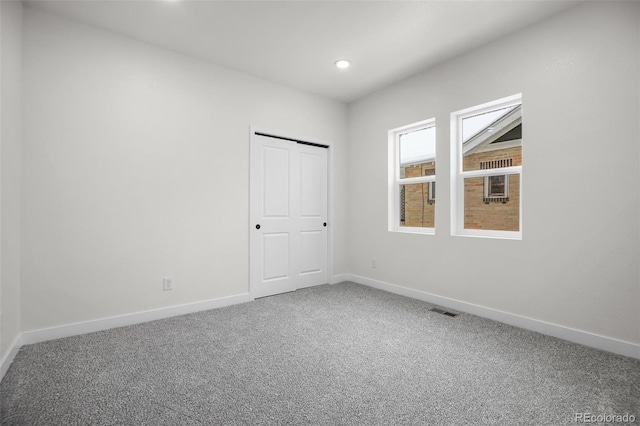 view of carpeted spare room