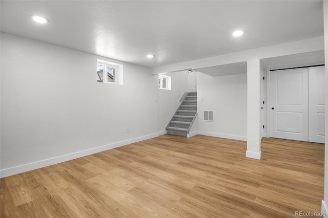 basement with light wood-type flooring