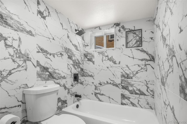 bathroom featuring tile walls, tub / shower combination, and toilet