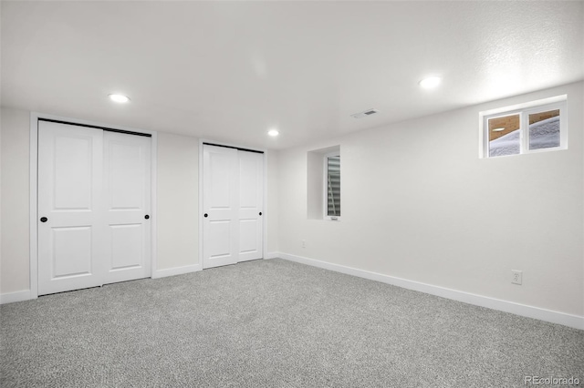 basement featuring carpet floors