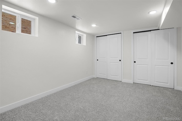 basement featuring carpet flooring