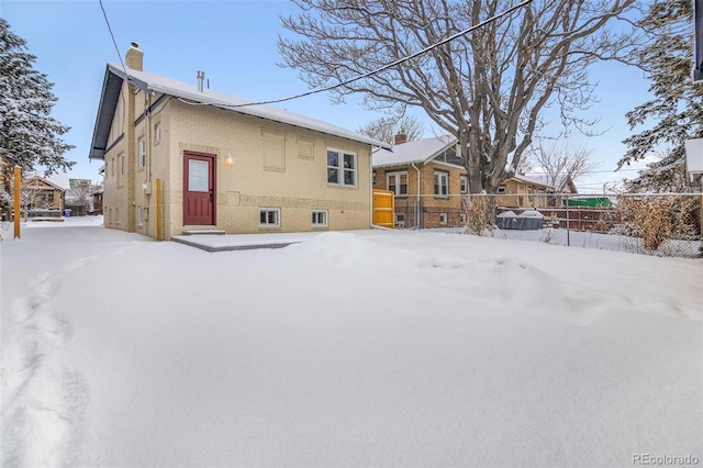 view of snow covered property