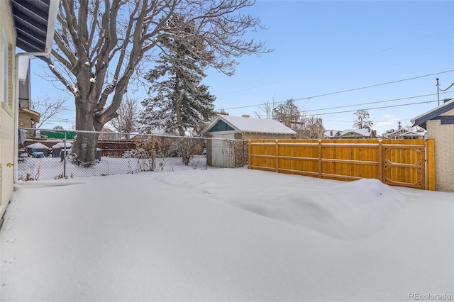 view of yard covered in snow