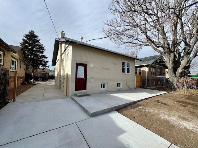 rear view of house with a patio