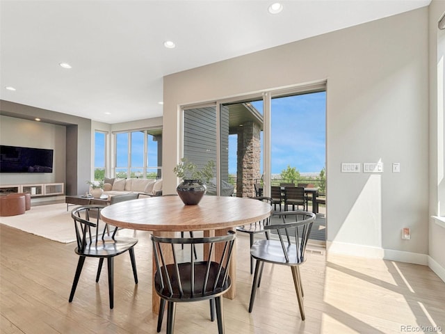 9395 Night Star Pl, Lone Tree, CO 80124 - dining space featuring light wood-style flooring and recessed lighting