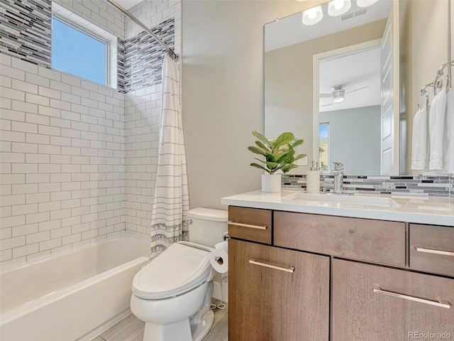 9395 Night Star Pl, Lone Tree, CO 80124 - bathroom with vanity, shower / tub combo, a ceiling fan, and tasteful backsplash