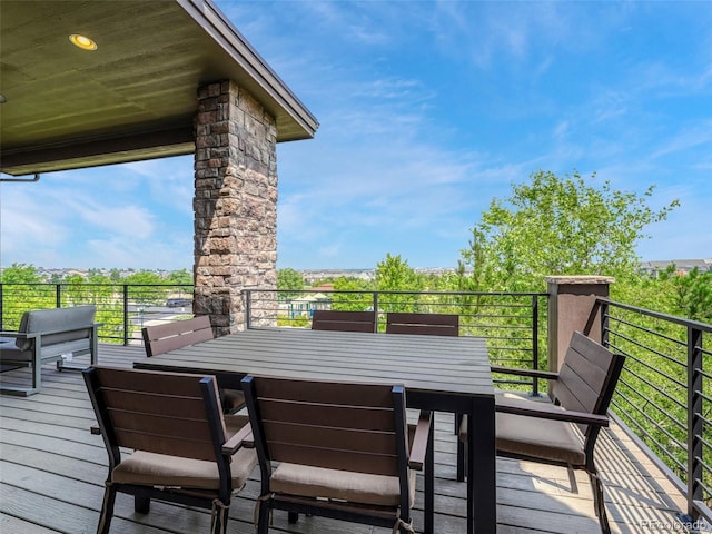9395 Night Star Pl, Lone Tree, CO 80124 - wooden deck featuring outdoor dining space