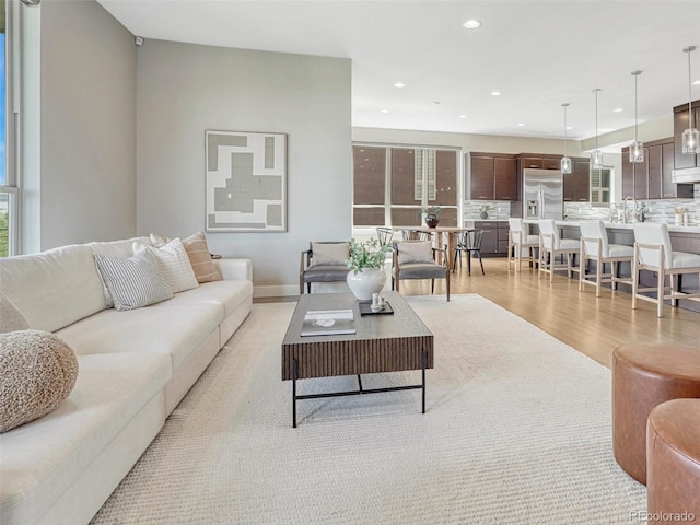 9395 Night Star Pl, Lone Tree, CO 80124 - living room with light wood-style flooring and recessed lighting