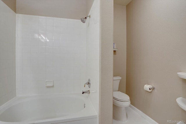 bathroom with baseboards,  shower combination, toilet, and tile patterned floors