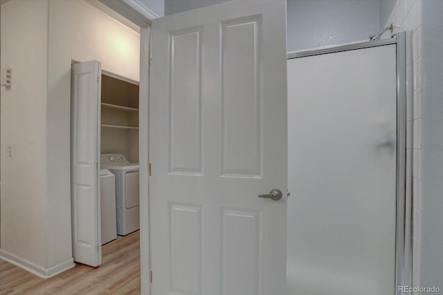 closet with separate washer and dryer