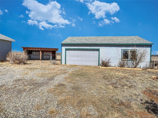 view of detached garage