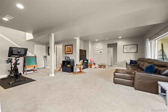 carpeted living room with baseboards and recessed lighting