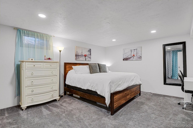 carpeted bedroom with a textured ceiling and recessed lighting