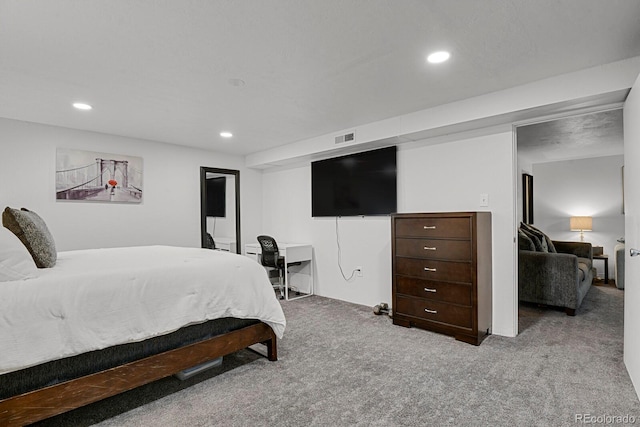 bedroom featuring carpet flooring, visible vents, and recessed lighting