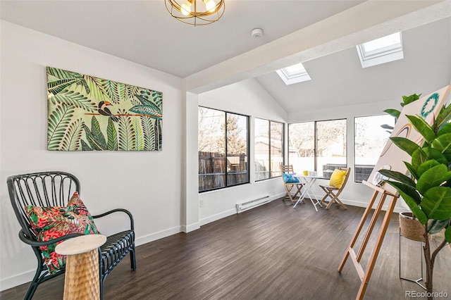 sunroom / solarium featuring lofted ceiling with skylight, plenty of natural light, and a baseboard radiator