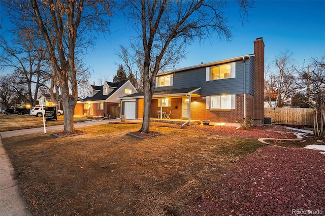 view of front of property with a garage