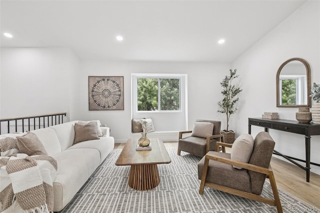 19954 E Dartmouth Ave, Aurora, CO 80013 - living room featuring wood finished floors and recessed lighting
