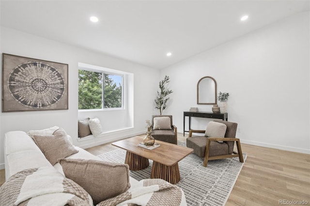 19954 E Dartmouth Ave, Aurora, CO 80013 - living room featuring light wood-style floors and recessed lighting
